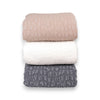 Stack of Earthy Cobblestone Blankets in three colors