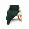 Green waffle throw blanket on chair