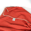 Close-up of orange waffle throw blanket