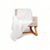 White waffle throw blanket on chair